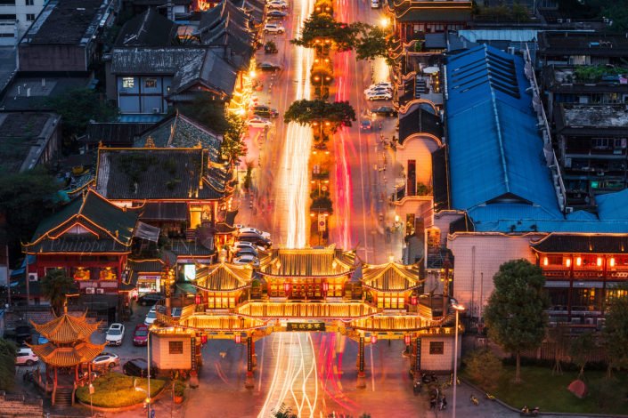 QinTaiLu gate aerial view at night with car light trails in Chengdu, Sichuan province, China