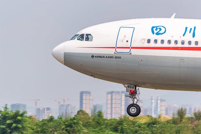 Sichuan airlines airplane landing in Chengdu close-up view, Sichuan province, China