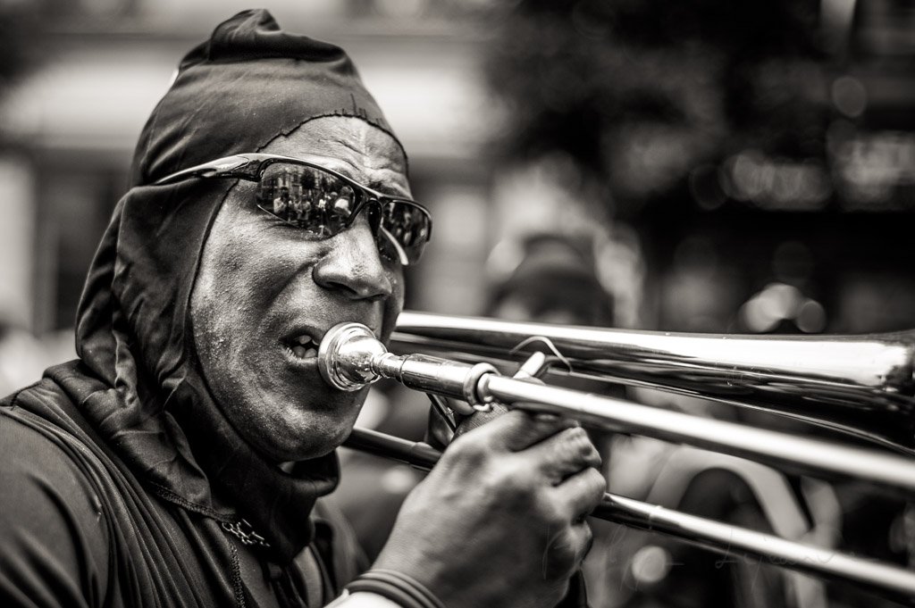Man playing trombone at the Paris tropical carnival, France