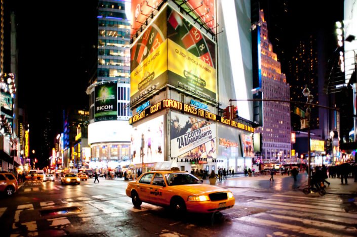 Times Square at night in New York City, USA