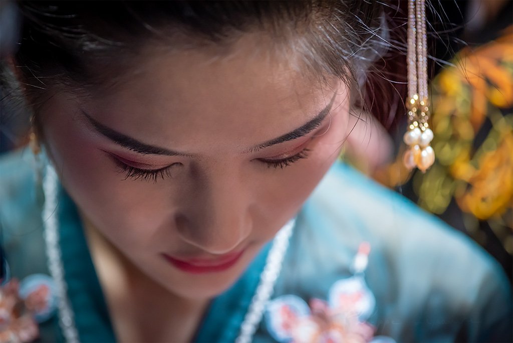 Young woman portrait with traditional clothes in Jinli for the mid-autumn festival, Chengdu, Sichuan province, China