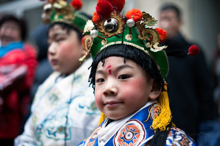 Child portrait at the chinese new year parade in Paris, France