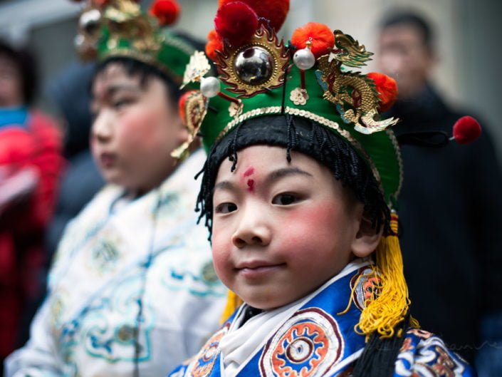 Child portrait at the chinese new year parade in Paris, France