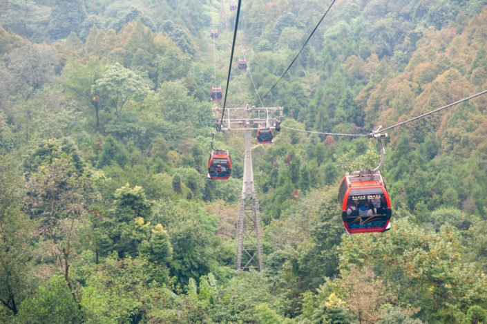 QingChengShan, Sichuan province, China - Sept 26, 2019 : Chinese tourists in cable car in QingCheng mountain.