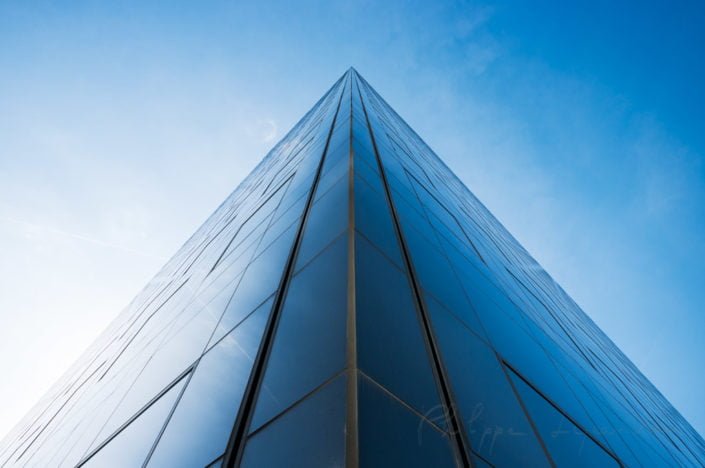 La Defense Paris financial district - Building pyramidal view against blue sky, Courbevoie, France