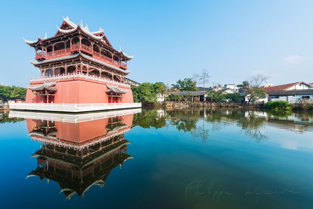 Luodai, Sichuan Province, China : Wufeng tower reflecting in the water