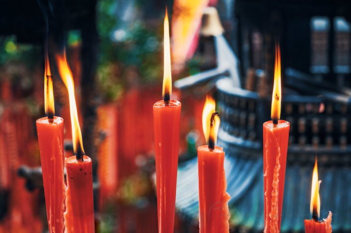 Red candles in a taoist temple in QingCheng mountain, Sichuan province, China