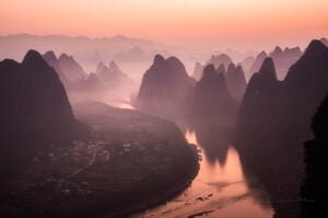 Mountain landscape in the mist at dawn with Li river from XiangGong ...