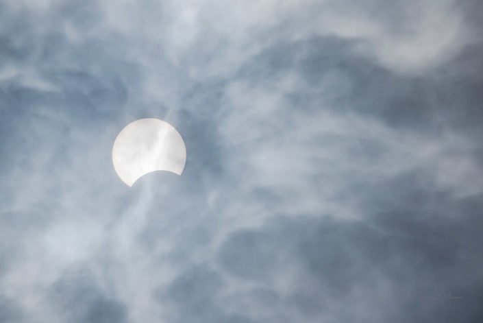 Partial sun eclipse behind clouds on Dec 26, 2019 in Chengdu, Sichuan province, China