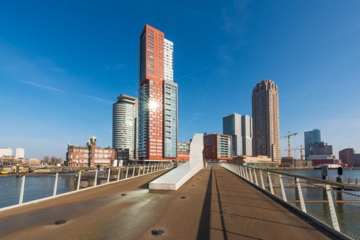 Rotterdam bridge and modern architecture in Wilheminapier with blue sky, Netherlands