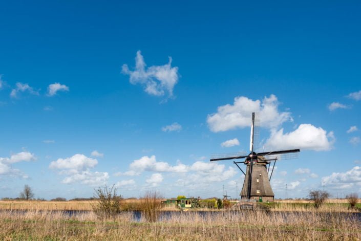Windmill and blue sky in Kinderdijk, Rotterdam, Netherlands