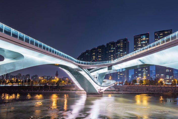 WuChaZi DaQiao modern bridge illuminated at night in Chengdu, Sichuan province, China