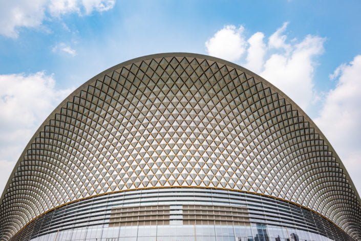 Chengdu open air music park modern building with futuristic architecture against blue sky, Sichuan province, China