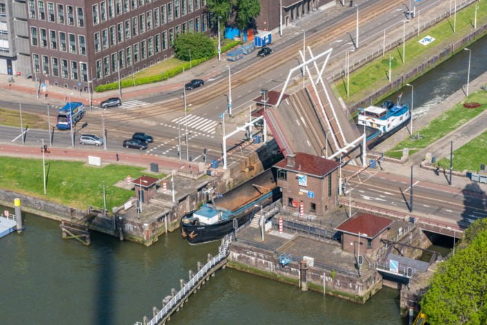 Bascule bridge opening in Westzeedijk street aerial view, Rotterdam, Netherlands
