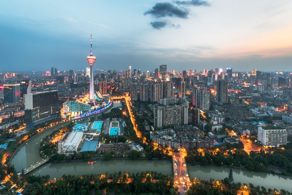 Chengdu West Pearl 339 TV tower aerial view at sunset with the river on the foreground, Sichuan Province, China