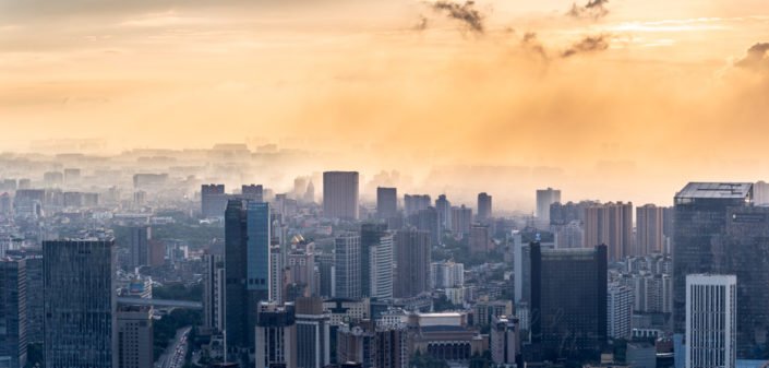 Chengdu backlight skyline aerial view with clouds on the city, Sichuan province, China