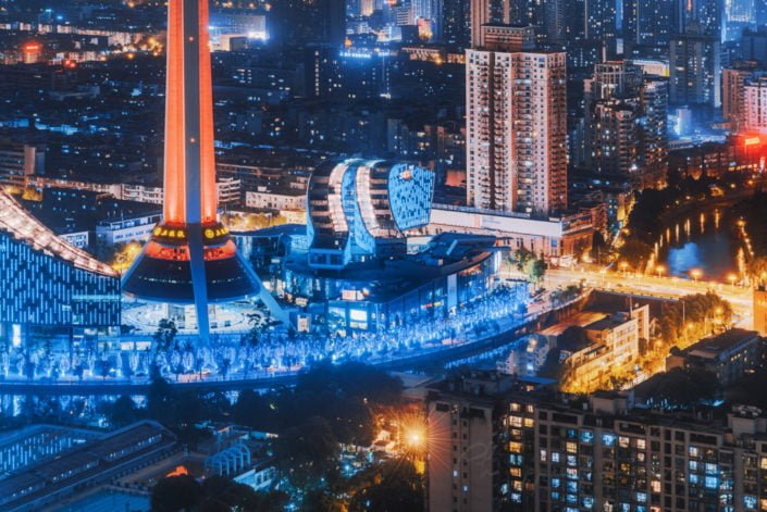 Chengdu West Pearl 339 TV tower illuminated at night aerial view, Sichuan province, China