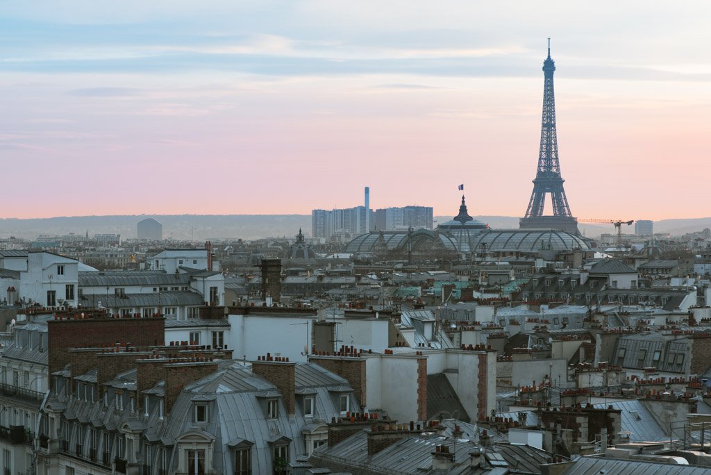 Paris skyline with Eiffel tower at dusk, France