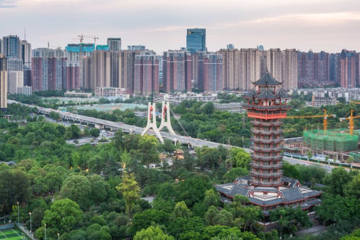 Chengdu Jiutian tower in TaZiShan park against skyscrapers, Sichuan province, China