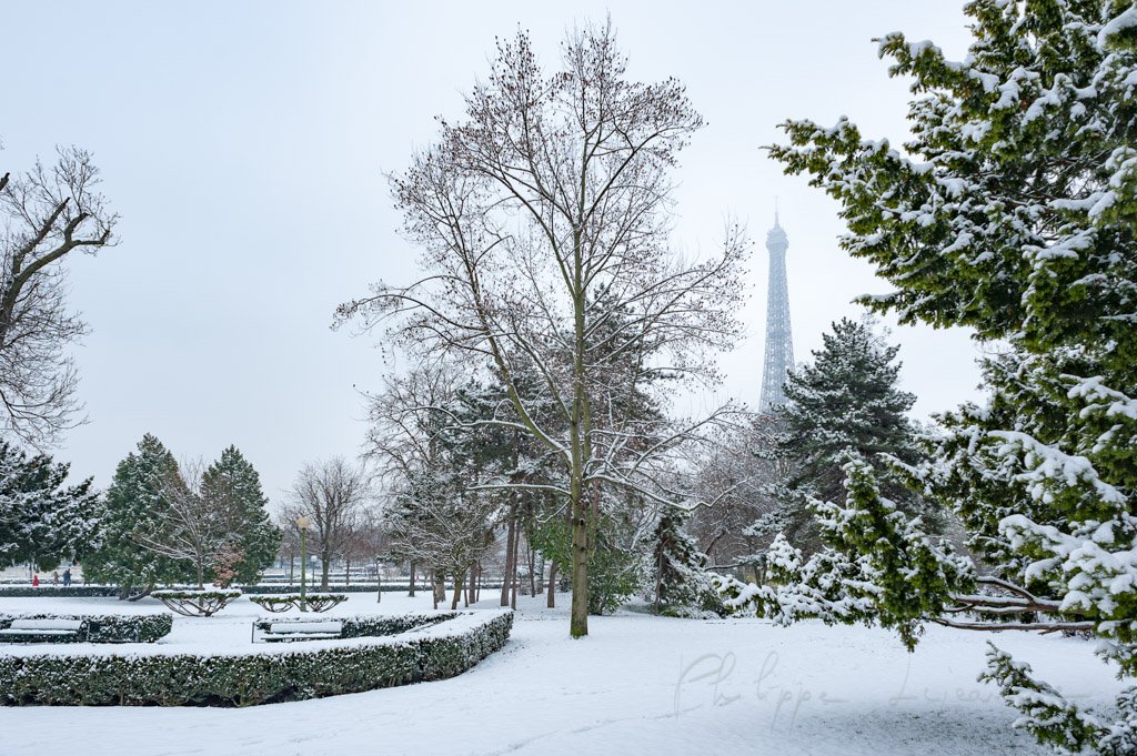 Eiffel tower in Paris under the snow from the Trocadero gardens in Paris, France