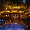 People's park famous HeMing teahouse main gate illuminated at night, Chengdu, Sichuan province, China