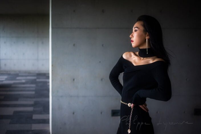 Young woman wearing a black dress portrait in Chengdu, Sichuan province, China