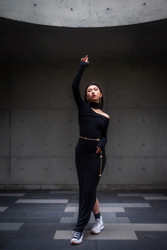 Young woman wearing a black dress portrait in Chengdu, Sichuan province, China