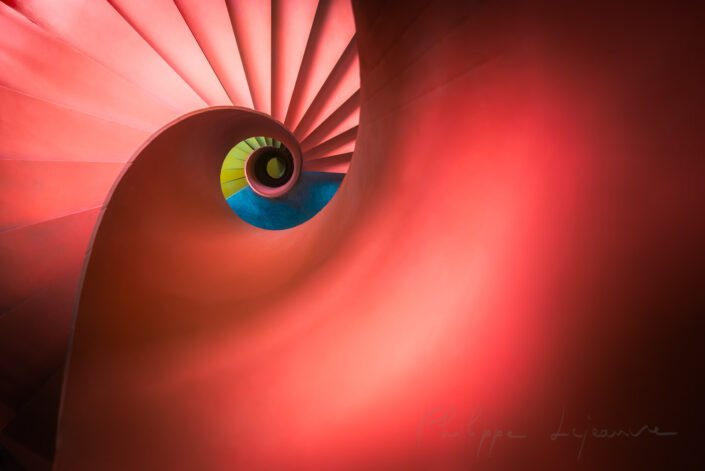 Red spiral staircase high angle vertical view in Chengdu, Sichuan province, China