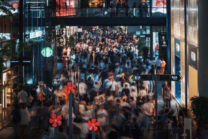 Moving crowd long exposure at night high angle view in Taikooli, Chengdu, Sichuan province, China