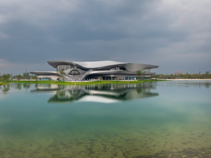 Chengdu, Sichuan province, China - Oct 27, 2023 : Science-fiction museum reflecting in a lake in ShiJie KeHuan park