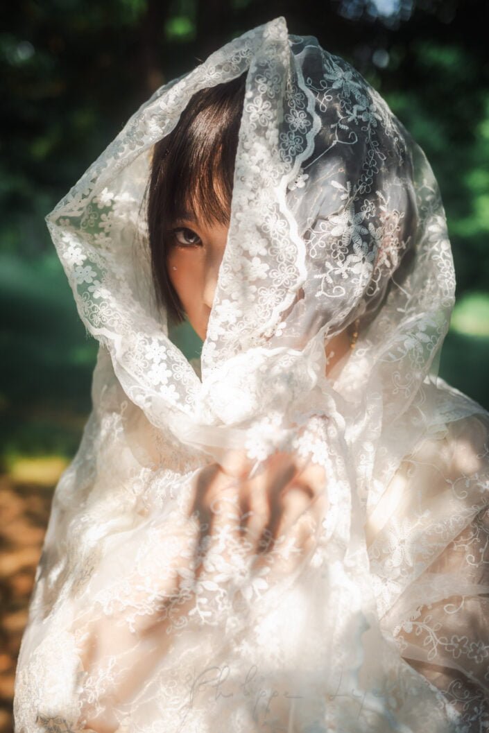 Young woman with a bridal veil portrait in JinCheng park, Chengdu, Sichuan province, China