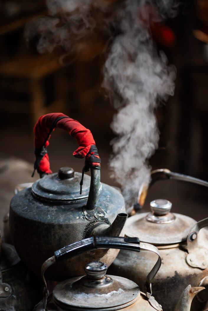 Ancient teapots on a charcoal oven in PengZhen teahouse, Shangliu, Sichuan province, Chengdu