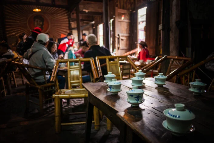 People having tea in an ancient tearoom in PengZhen teahouse, Shangliu, Chengdu, Sichuan province, China