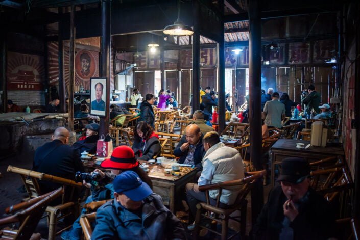 People having tea in an ancient tearoom in PengZhen teahouse, Shangliu, Chengdu, Sichuan province, China