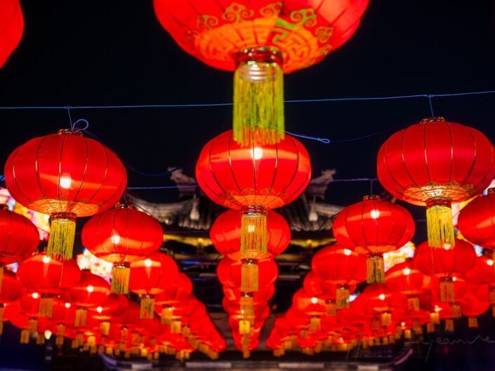 Red Chinese lanterns low angle view at night for the year of the dragon in DongMenShiJi market Chengdu, Sichuan province, China